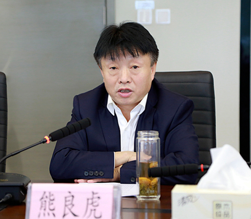 熊良虎会见陕西地电（集团）公司党委书记、、、董事长邹满绪