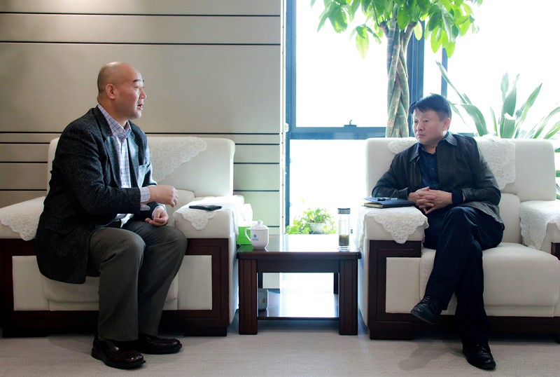 熊良虎会见华彩咨询公司董事长、、总裁白万纲
